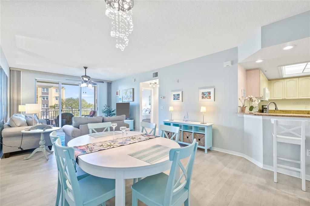 Dining and Living Room decorated with a coastal theme.