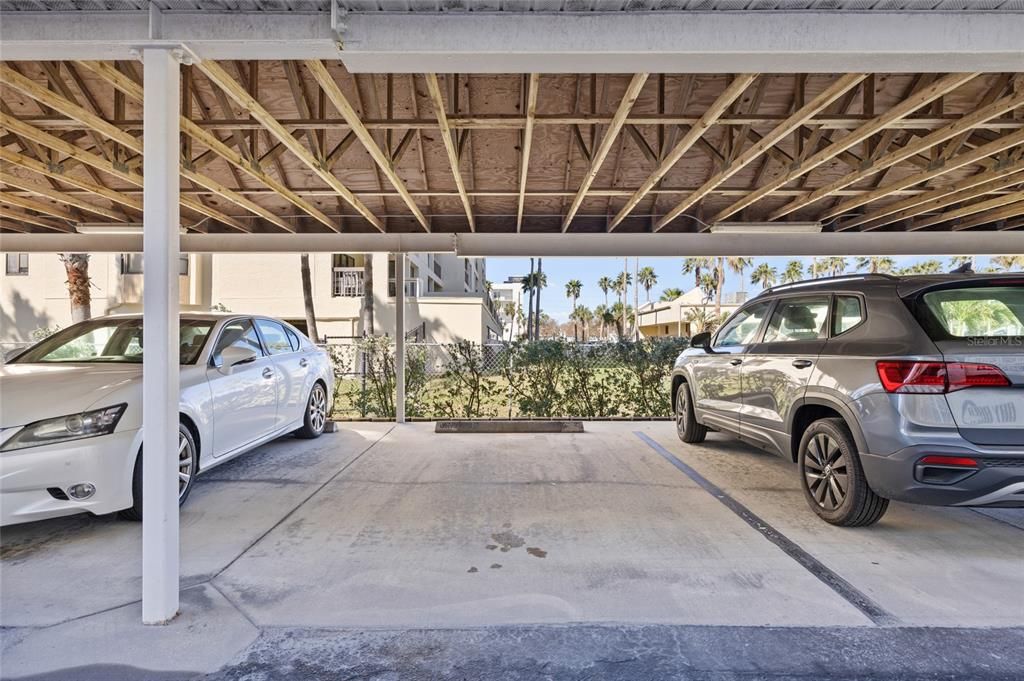 Assigned parking under carport. Plenty of guest parking.