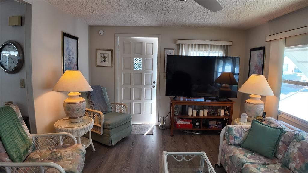 Living Room with access to the front screened porch