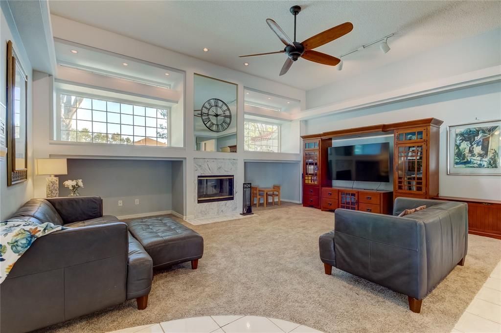 family room has vaulted ceiling