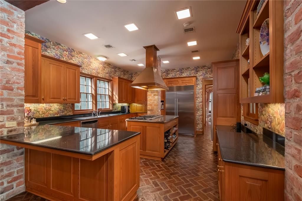 Reclaimed Brick Floors and Stone Countertops