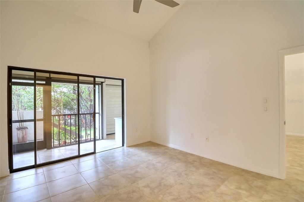 Master bedroom opens to screened porch