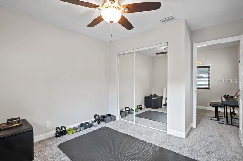 Bedroom #3 has a large closet with mirrored doors.