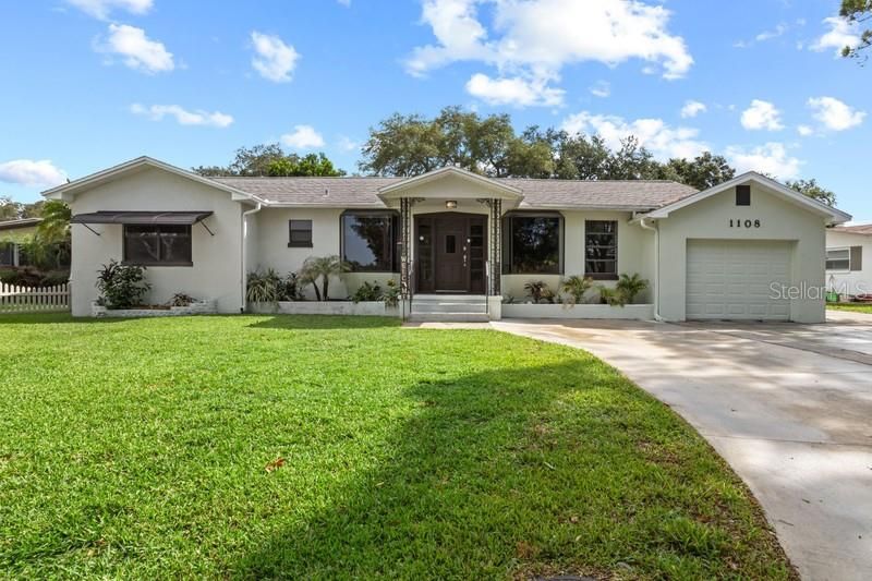 The home sits on a lovely lot with views of Lake Ibis.