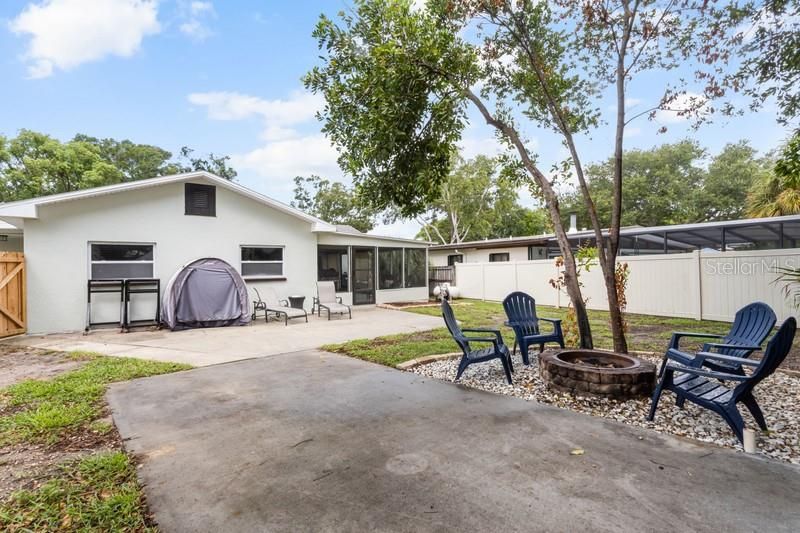 Rear view of home.  The property is fenced in.