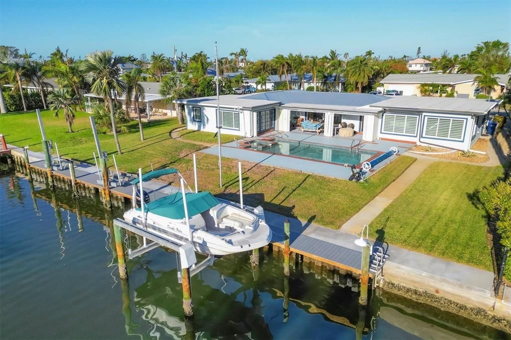 Backyard view, dock with boatlift