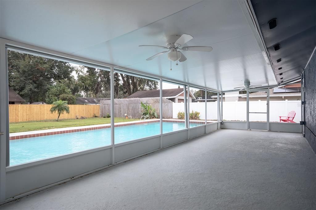 Huge screened patio overlooking pool and yard