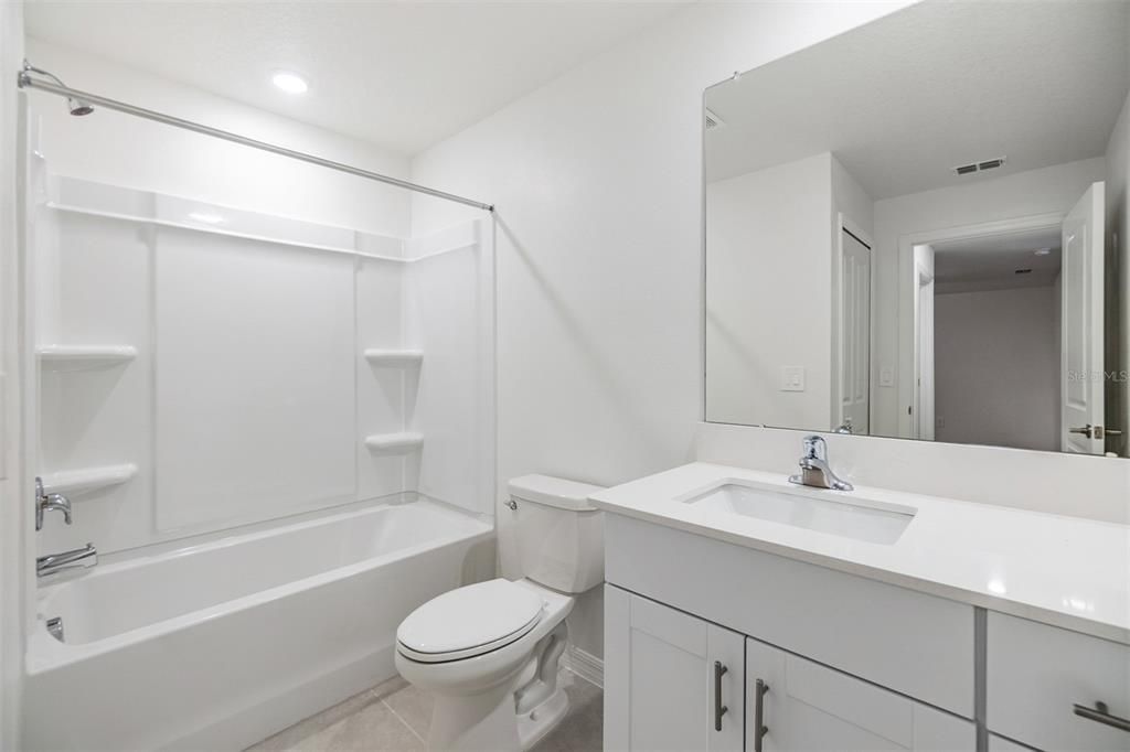 Secondary bathroom with tub/shower combo