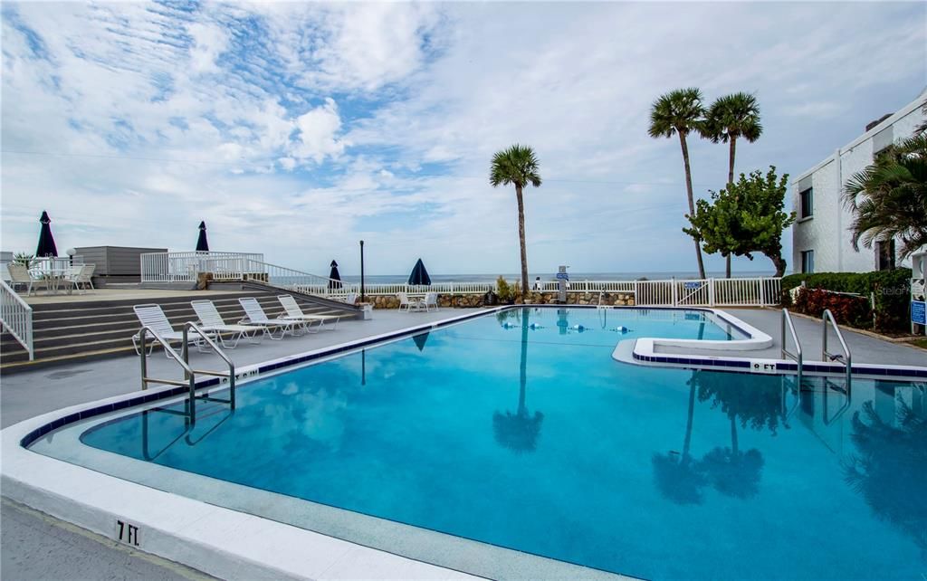 One of the largest community pools along Tarpon Center Dr. And lovely patio for gatherings and sunset viewings. Pre-Hurricane Helene and Milton. Currently being completely refurbished.