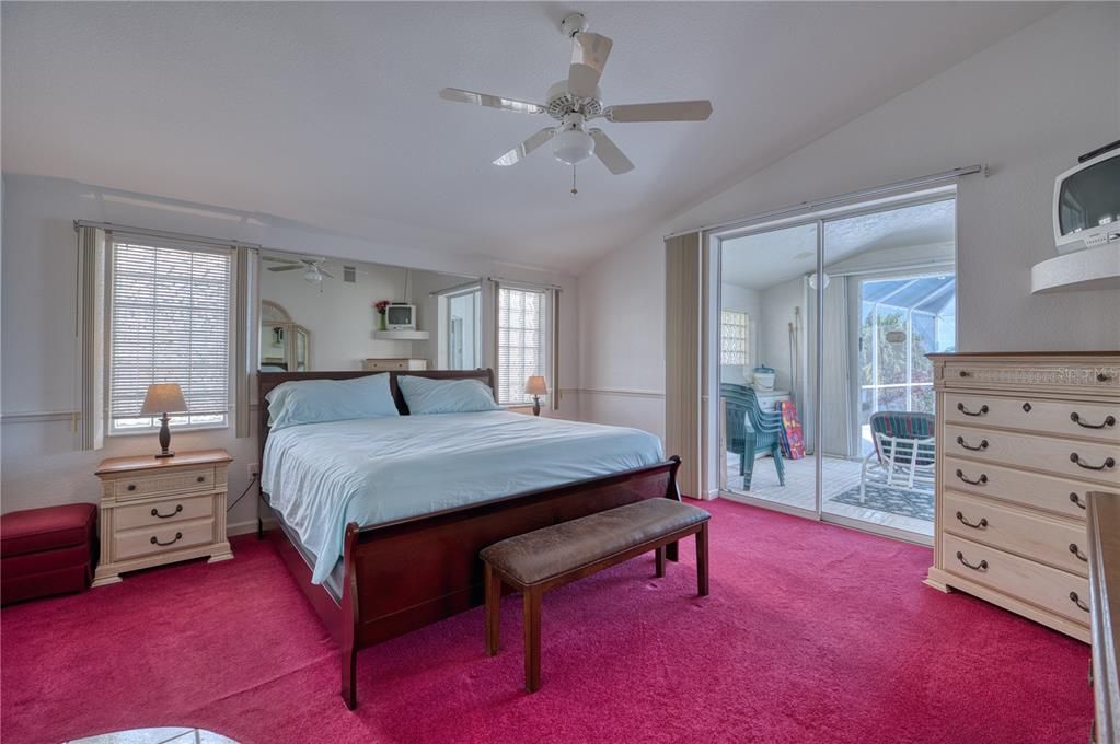 Master Bedroom with entry to Lanai/Pool