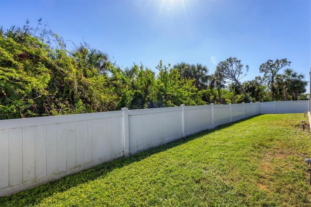 fenced back yard for the fur babies