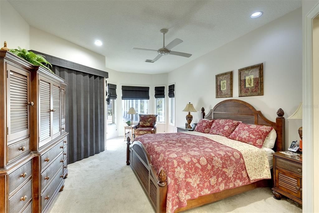 Large master suite with a lake view.