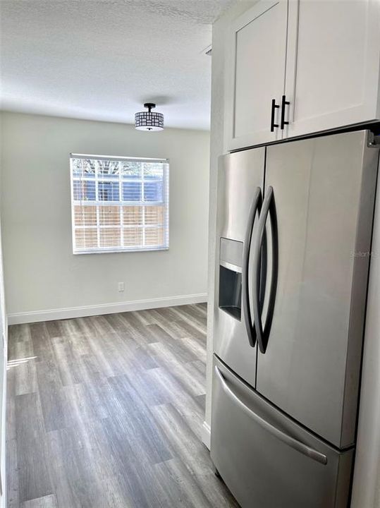 Kitchen and going into office/bonus room.