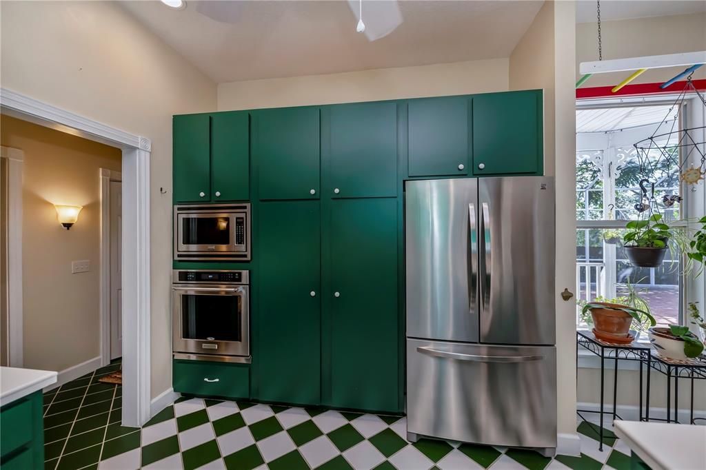 LOTS of cabinet space and gleaming stainless appliances.