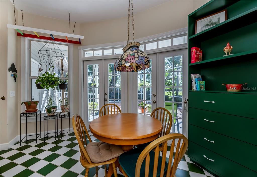 A room of marvelous beauty, this informal nook opens to the oversized lanai.