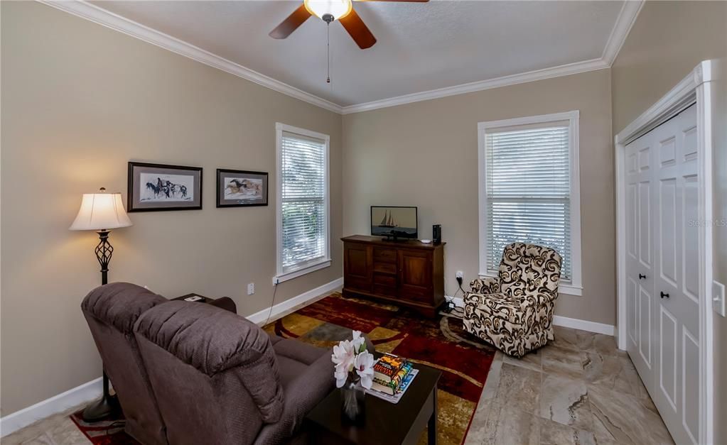 Back bedroom, shown as a study and retreat room.