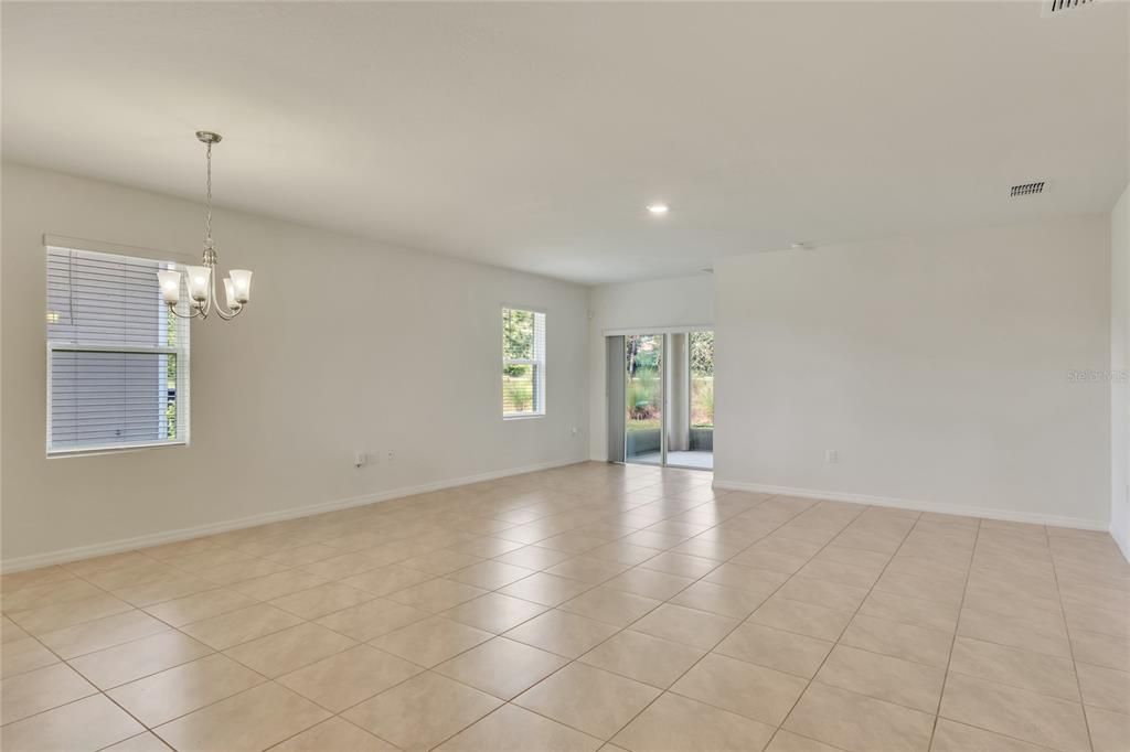 Great Room featuring Sliding Glass Doors to Screened-In Covered Patio