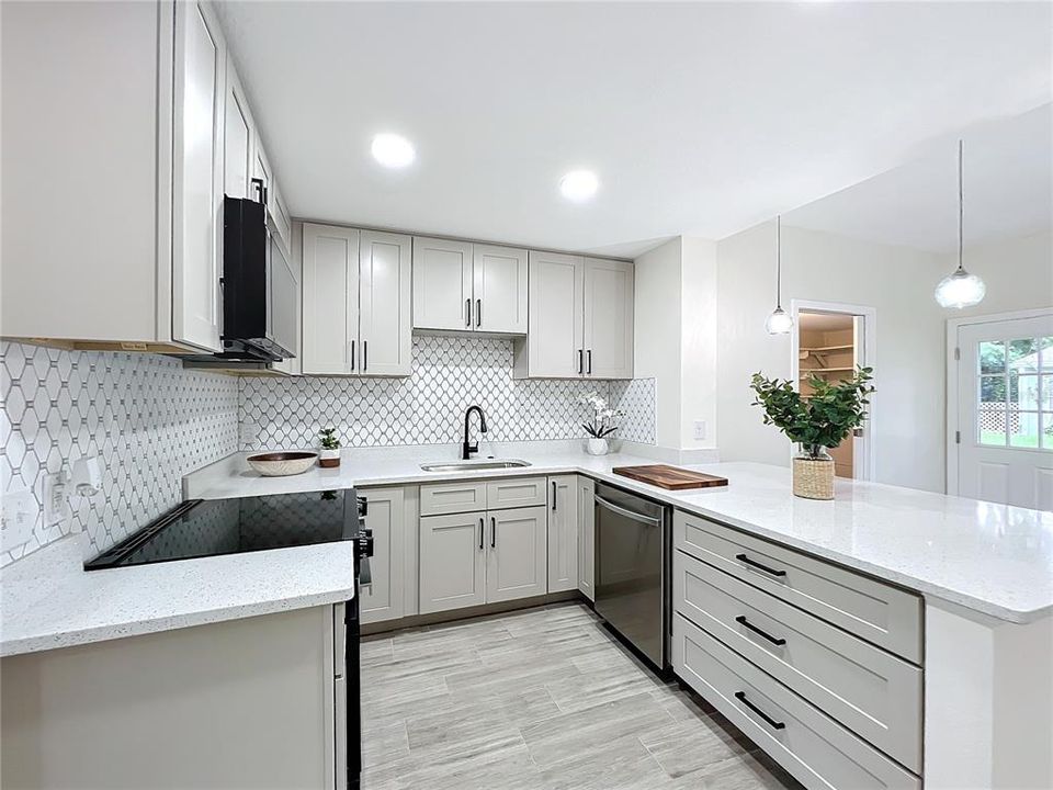 Brand new cabinets and quartz counters!