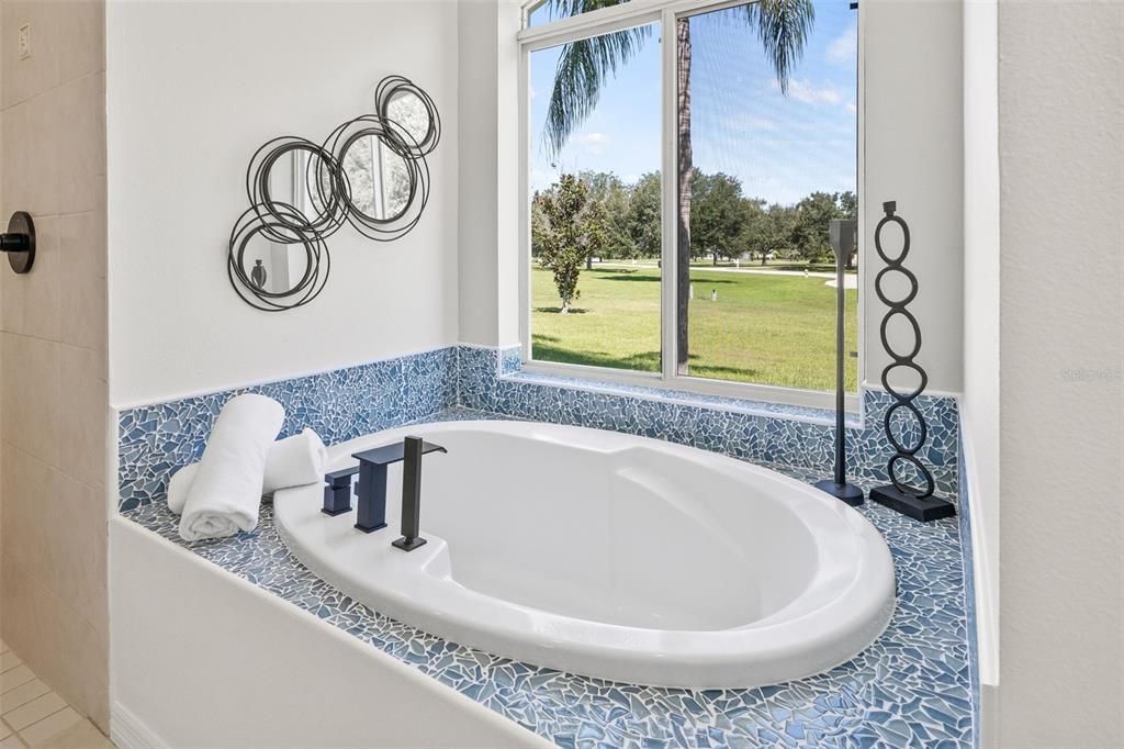 18307 White Fang Ct, Parrish FL 34219 FoxBrook Communities, MLS#A4630266Downstair primary bathroom, custom tile design