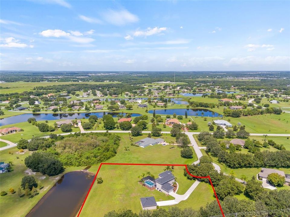 18307 White Fang Ct, Parrish FL 34219 FoxBrook Communities, MLS#A4630266Pond on the outside of the lot