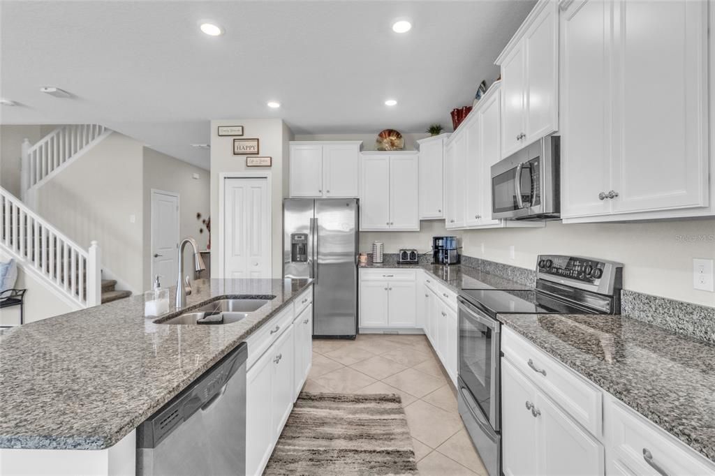 Great Prep Area. Granite Counter tops. Stainless Steel GE Appliances.