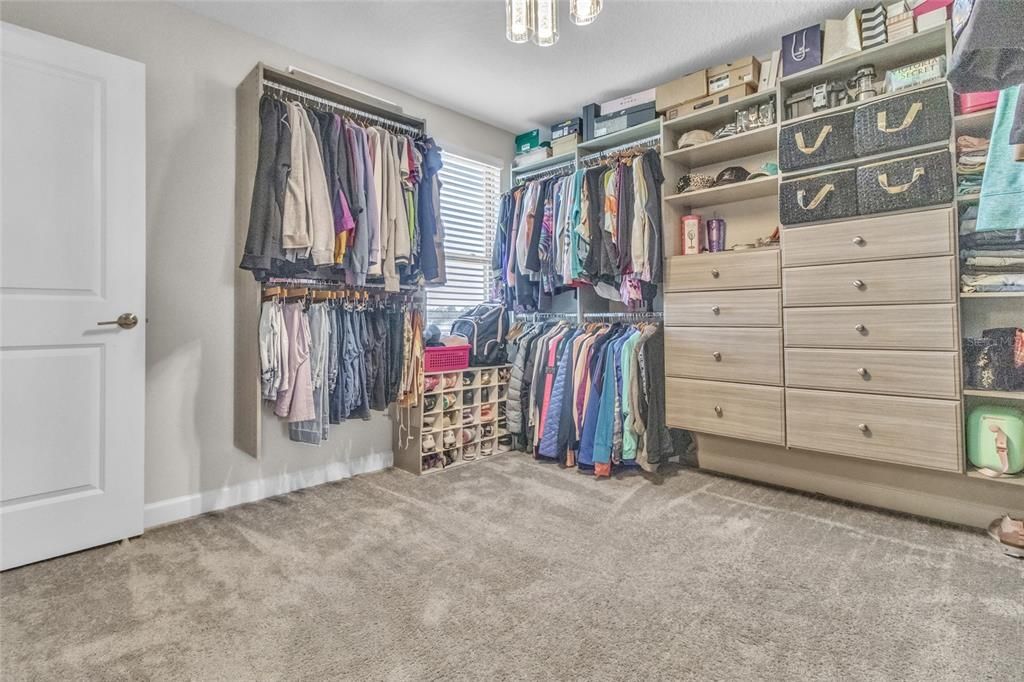 4th bedroom was converted into a fashionista's closet! Storage is not a problem here!