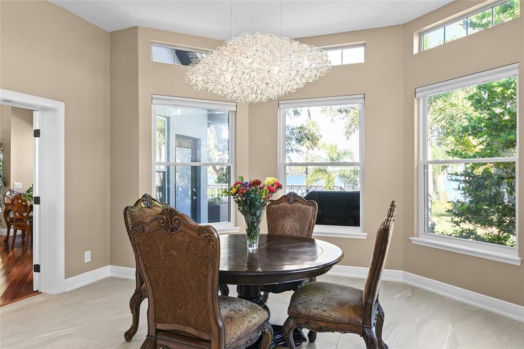 Tranquil lake views from the kitchen and a priceless chandelier