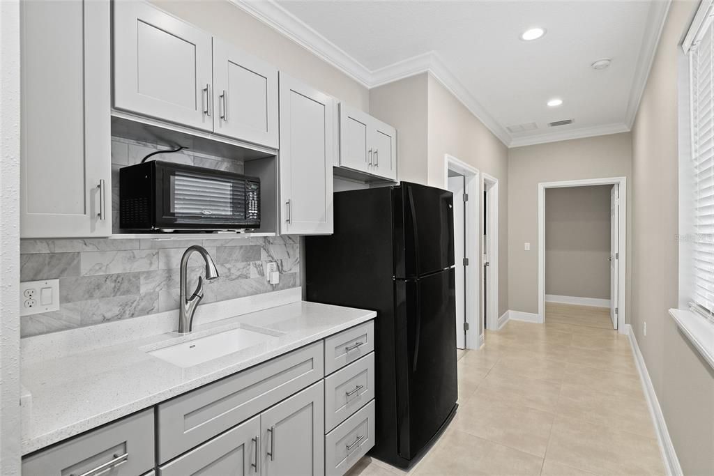 Remodeled sleek kitchen in apartment