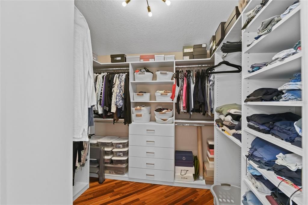 Plenty of functional storage in the primary walk-in closet