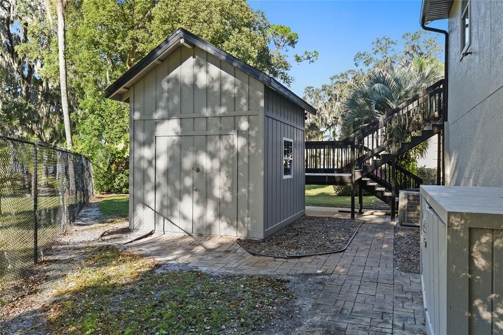 A large separate matching storage shed