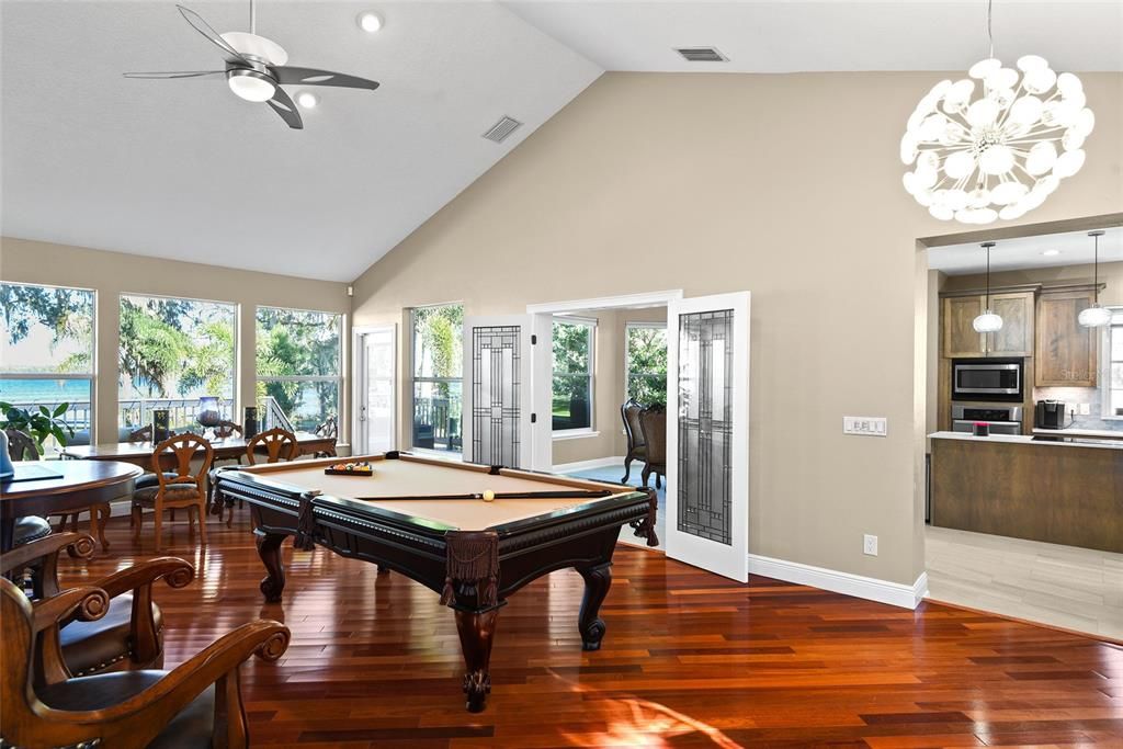 More wonderful views and a door leading to the back deck and French doors welcoming you into the eat-in kitchen