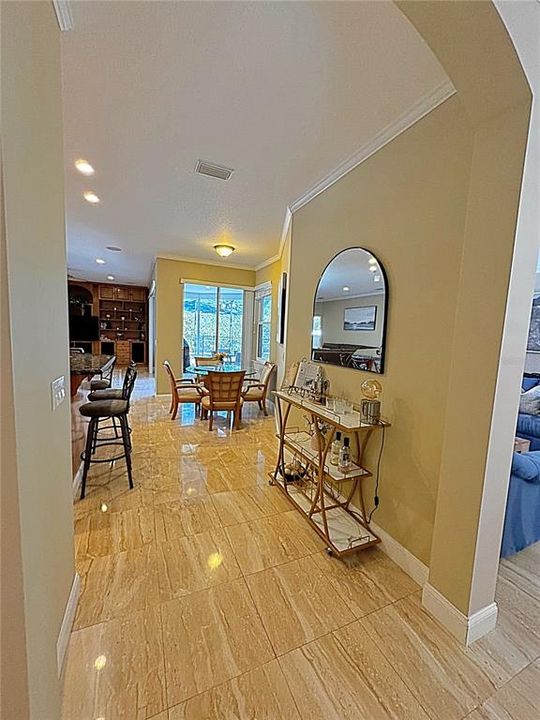 Leading from dining room to the kitchen and family room.