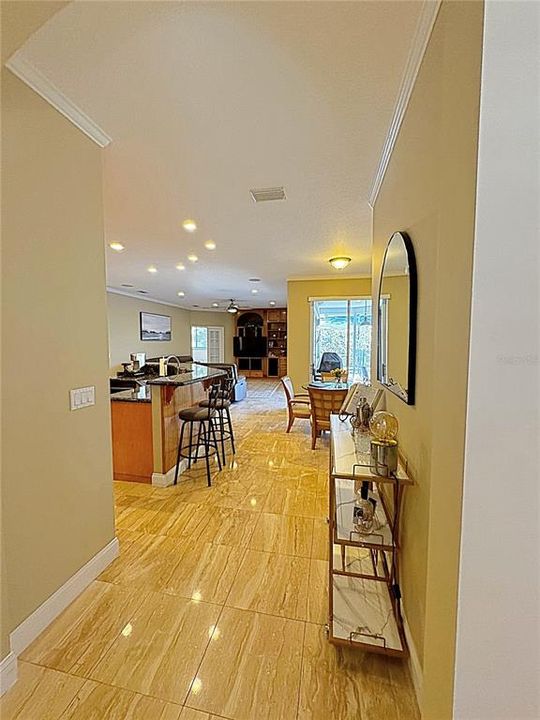 Leading from dining room to the kitchen and family room.