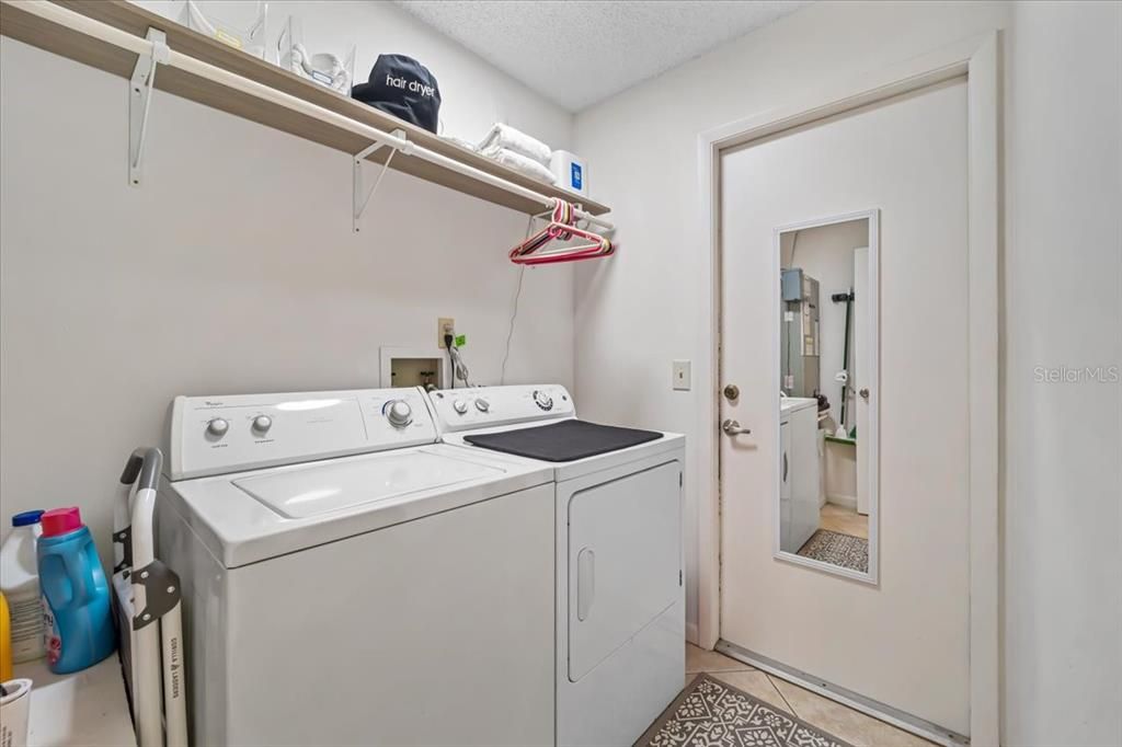 Laundry Room adjacent to foyer