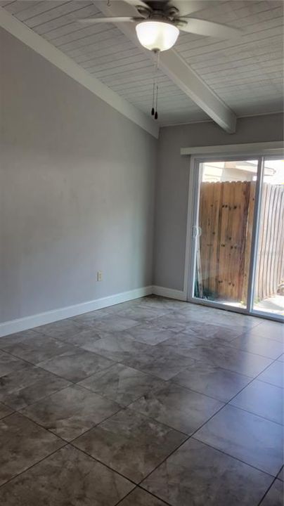 main bedroom with vaulted ceiling