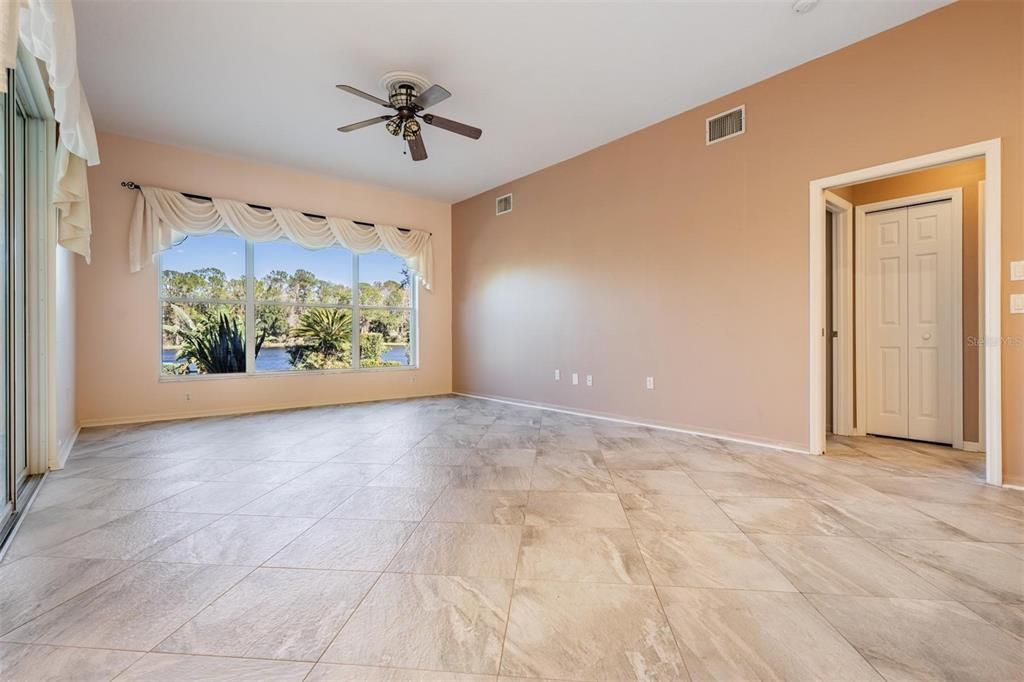 Family room with direct access to the lanai thru sliding glass door on the left