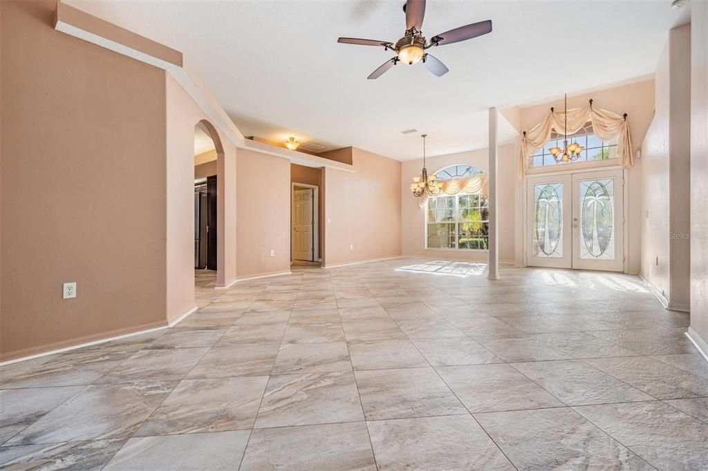 High ceilings with large windows and easy care tile