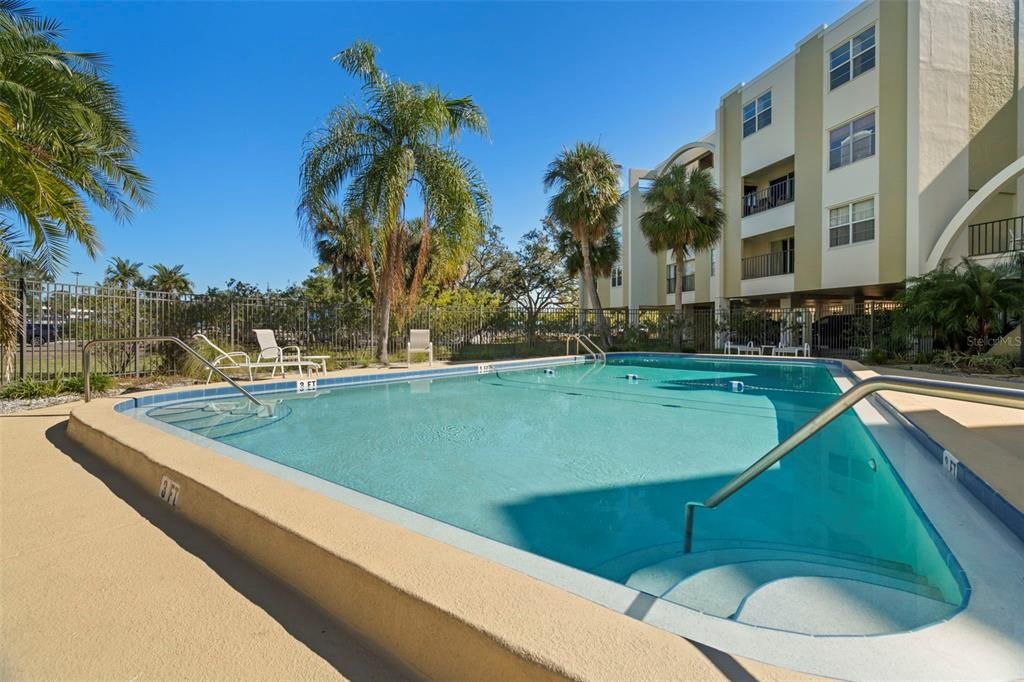 Pool, clubhouse and grilling area.