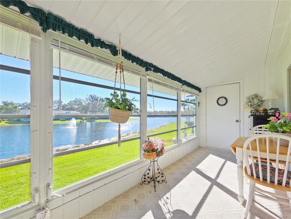 Lanai with view of Lake Sparkle and storage closet