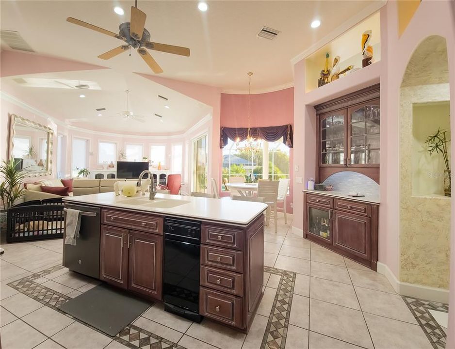 Kitchen with induction cooktop, tile flooring