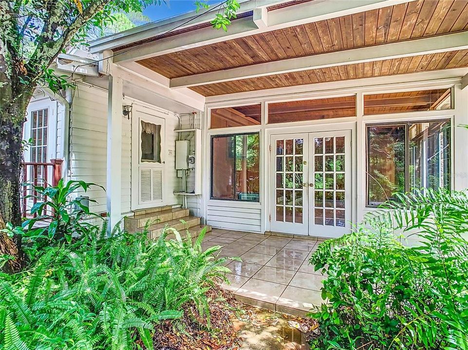 Back Porch with tile flooring.