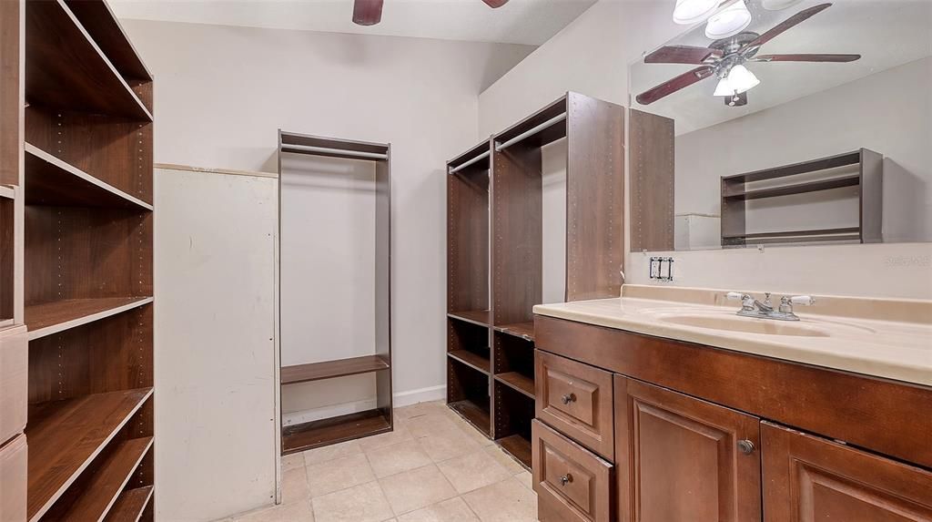 Large walk in closet in primary bedroom. Also contains the 2nd vanity for the primary bedroom.