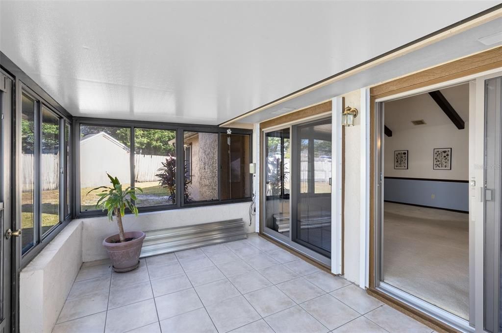 Enclosed porch off of dining and living room