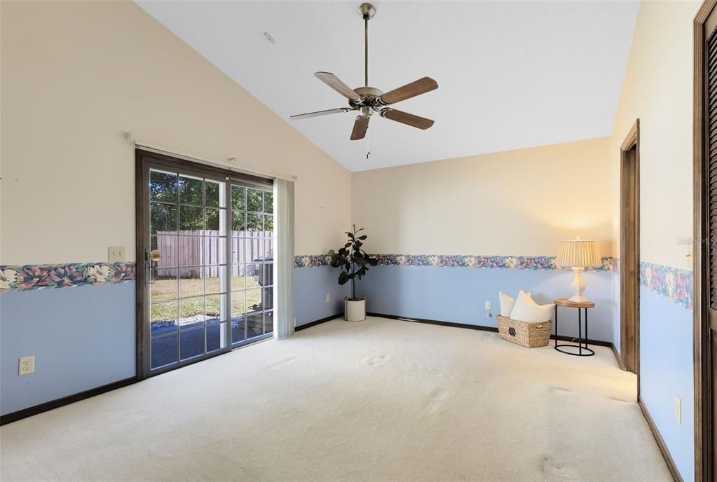 Primary Bedroom with Anderson sliders to the backyard