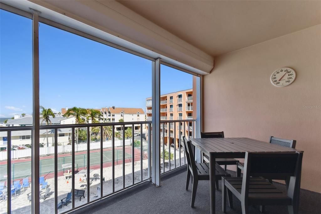 Spacious balcony with room for dining and relaxation