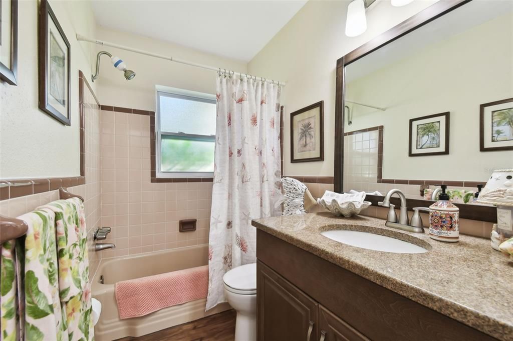 Hall bath shared by two bedrooms...in excellent condition.