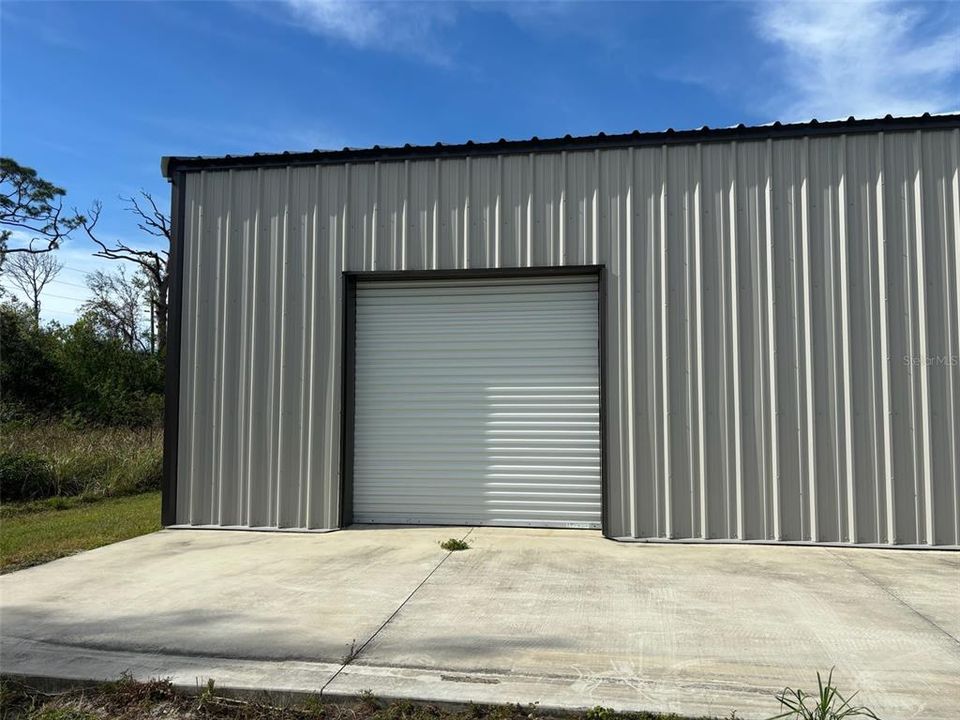 3rd entrance door to the 30 x 30 building, 8 ft by 8 ft