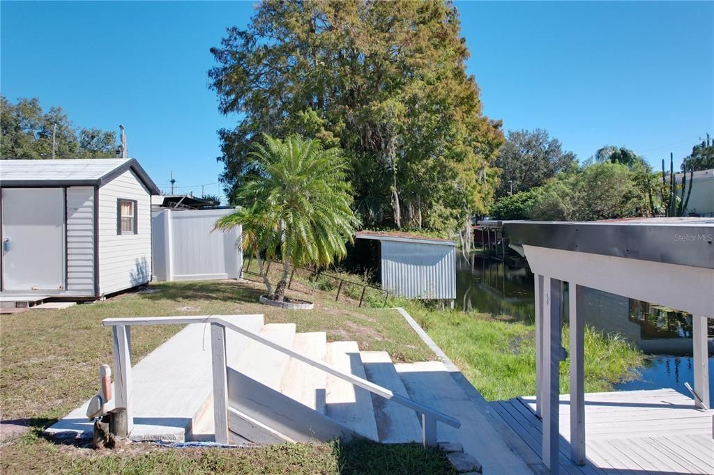 Freshley made concrete stairs leading to the boat house