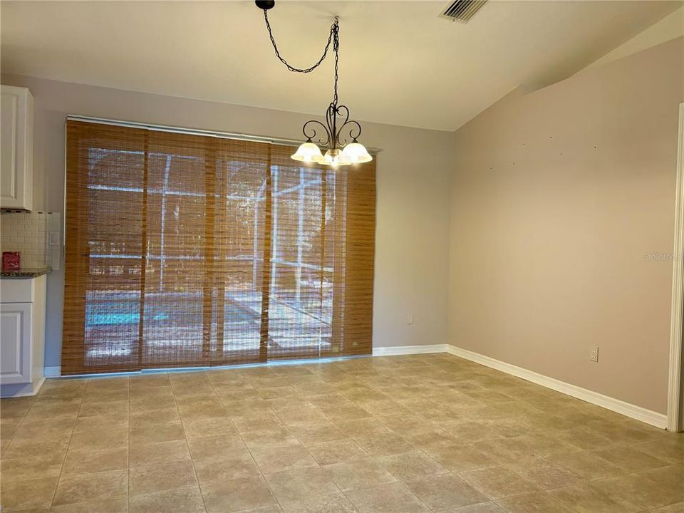 Dining room with bamboo shades