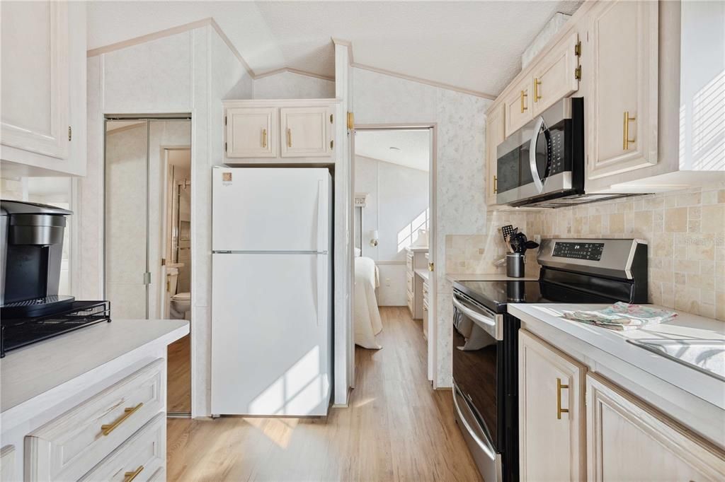 Kitchen looking to bedroom